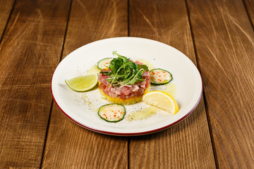A beautiful seafood dish on a wooden background
