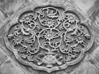 Old Chinese mural with a picture vase and flowers