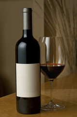 Wine bottle and glass