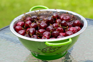 sweet cherries on grass