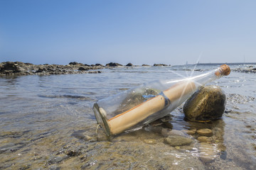 Message in a bottle on the beach of Tarifa, Spain.
