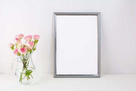 Silver frame mockup with pink roses