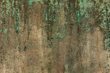 Old metal surface is covered with peeling green paint colors. background