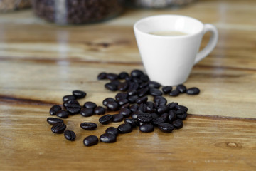 cup of coffee with coffee beans