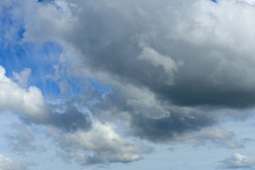 Obraz premium White cloud on blue sky backdrop