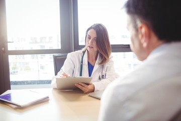 Female doctor sitting at her desk