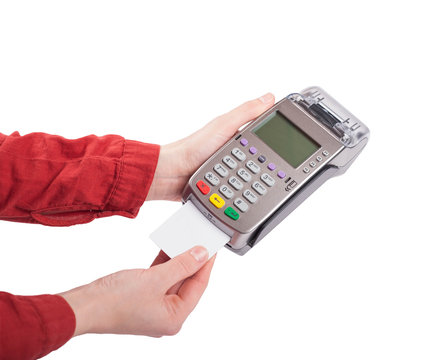 Inserting  credit card in pos terminal isolated on white