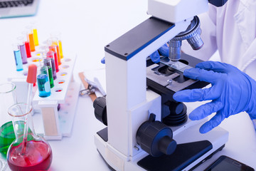 Laboratory microscope research. Scientist people study and anlaysis in lab room.