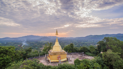 Big Buddha ang golden pagoda on hilltop this temple have several amazing building and famous in thailand.this temple is beside national park. the middle part of Thailand