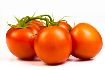 Bunch of ripe fresh red tomatoes
