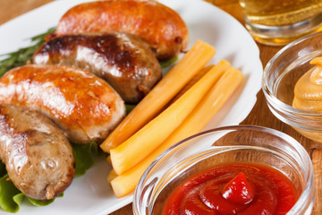 Beer and roast beef or chicken sausage