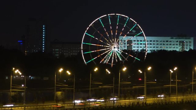 Glowing lights wheel review, night city, on road going cars
