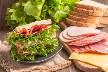 Club sandwich on a rustic table