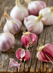 fresh garlic on wooden surface