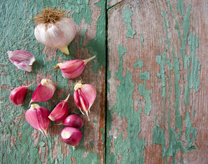 fresh garlic on wooden surface