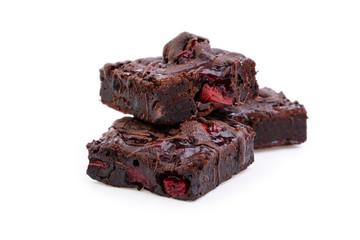 Delicious vegetarian brownie with cherries isolated on white bac