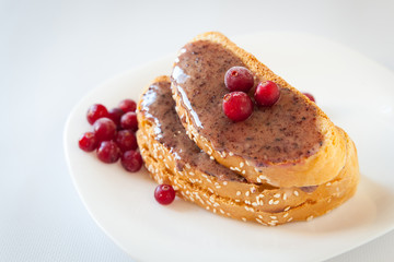 Sandwiches with cream honey and cranberries