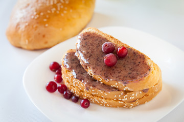 Sandwiches with cream honey and cranberries