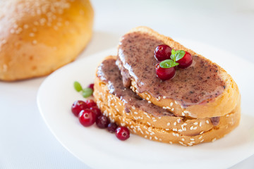 Sandwiches with cream honey and cranberries