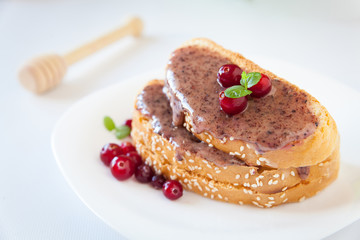 Sandwiches with cream honey and cranberries