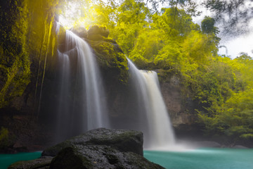 Fototapeta na wymiar Amazing beautiful waterfalls in autumn forest