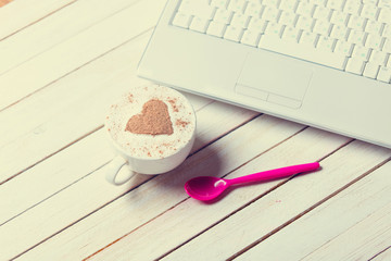 cup of coffee and laptop