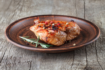 grilled meat on the clay plate