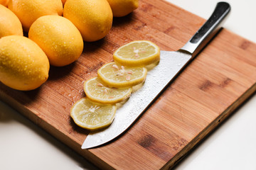 Slices of lemon on a knife. Isolated