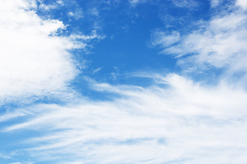 Fantastic soft white clouds against blue sky background