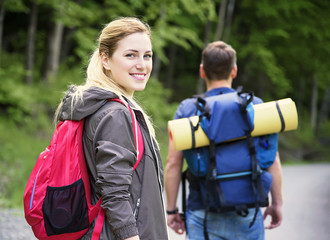 Hikers in forest.