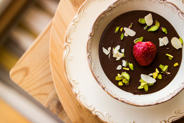 Chocolate pudding with strawberry / homemade