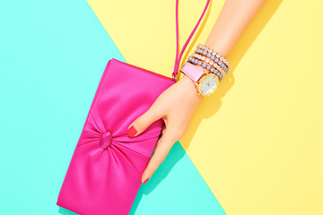Fashion. Clothes Accessories fashion Set. Female hand Stylish Trendy Handbag clutch, Glamor Wrist Watches. Summer fashion girl Outfit, Luxury Party accessories.Hipster Essentials.Minimal fashion style