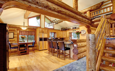 Log cabin house interior of dining and kitchen room