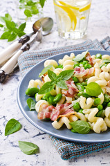 Pasta with bacon and vegetables