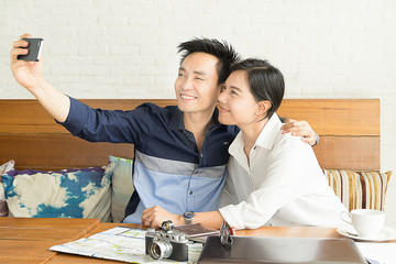Fototapeta premium asian people selfie ,one man and one woman