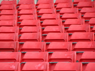 Fototapeta premium Stand Platform in Perspective with Red Plastic Seats