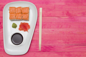 sushi  set on white plate with wasabi and  ginger