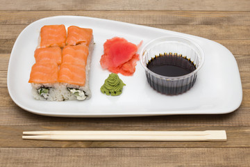 sushi  set on white plate with wasabi and  ginger