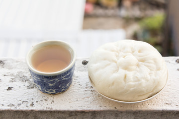 Chinese tea and dumplings streamed.