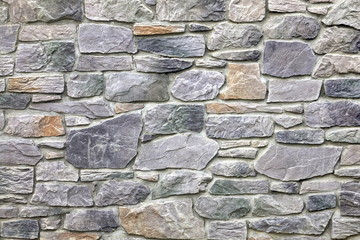 Obraz premium Modern Stonewall Backround Texture Decorated With Multicolored N