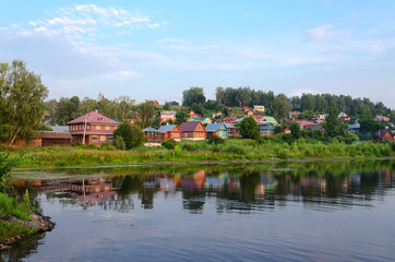 View of provincial town of Ples on shore of pond