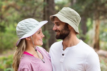 Hiker couple looking at each other