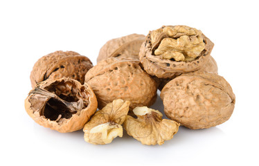 walnut and a cracked walnut isolated on the white background