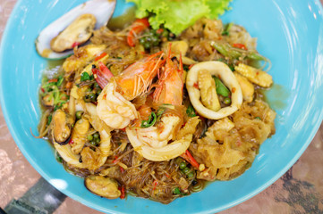vermicelli fried with spicy seafood.