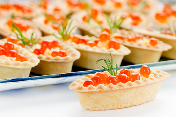 Tartlets with red caviar