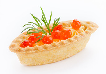 One tartlet with red caviar close up isolated on white backgroun
