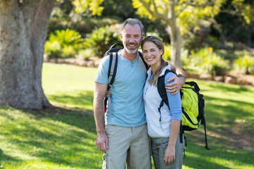 Portrait of hiker couple embracing each other