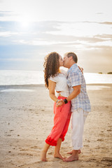 Romantic Couple Kissing on the Beach Portrait