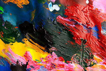 Oil paints multicolored closeup abstract background from above
