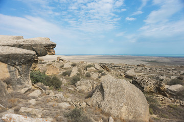 Fototapeta na wymiar Landscape in the area Qobustan national park in Azerbaijan. View of the Apsheron Peninsula